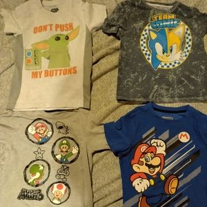 Lot of 4 boys T-shirts size 6/7 small